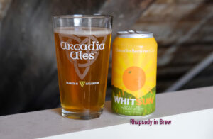 photo of Arcadia Whitsun in an Arcadia glass, with the can next to it